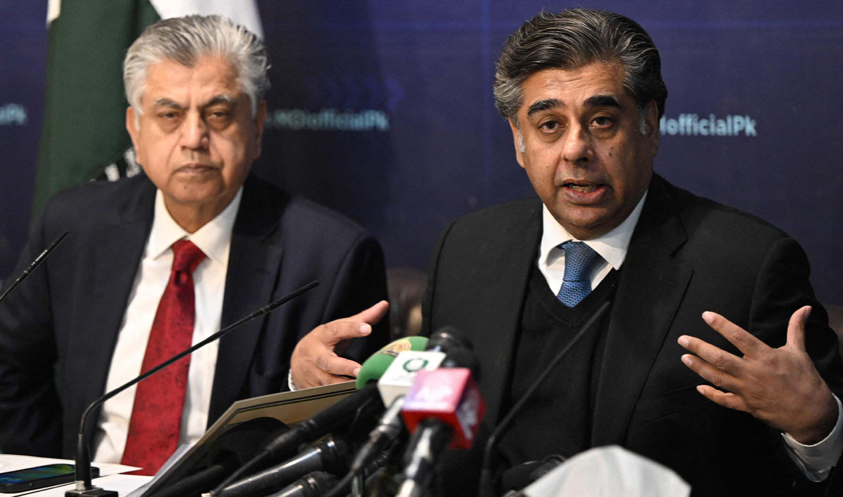 Pakistan's caretaker Interior Minister Gohar Ejaz (R) and caretaker Information Minister Murtaza Solangi address a press conference on election safety in Islamabad on February 6, 2024, ahead of the upcoming general election. (AFP/File)