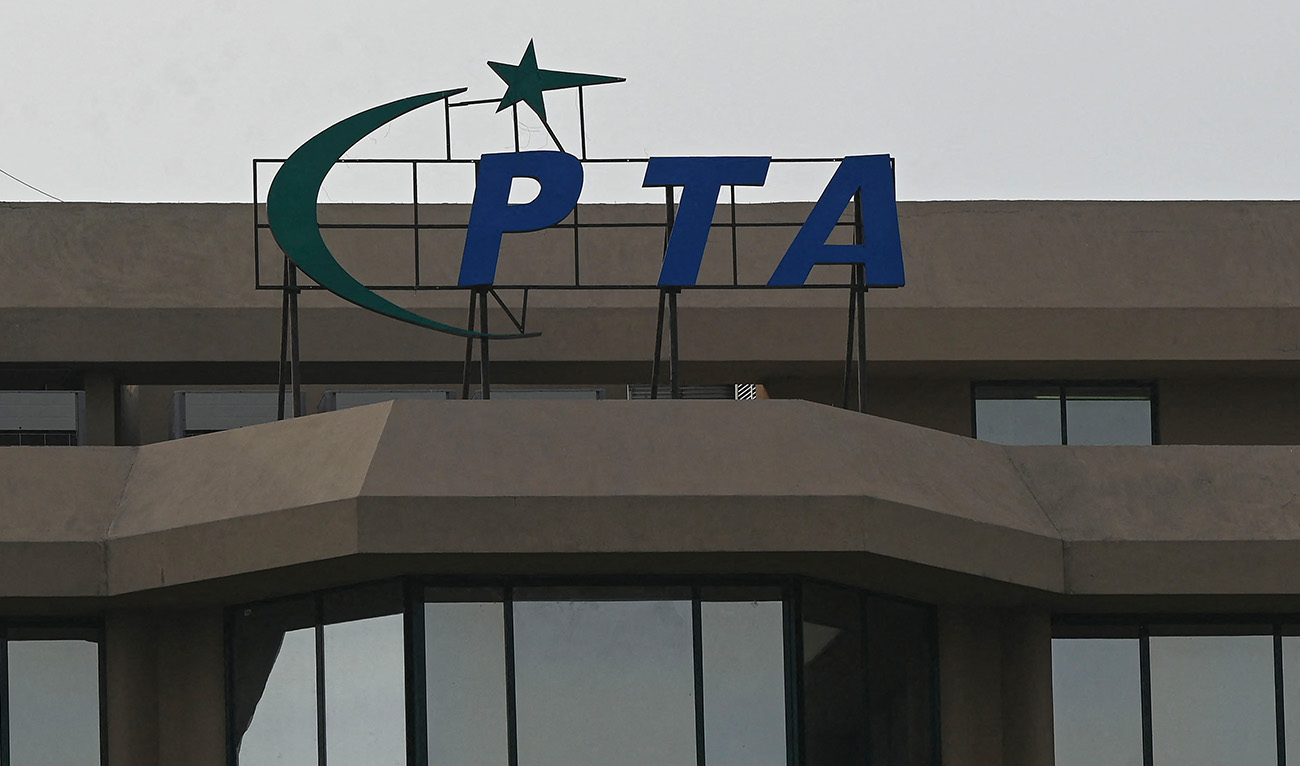 The logo of the Pakistan Telecommunication Authority is pictured on the building facade at its headquarters in Islamabad on June 24, 2023. (AFP)