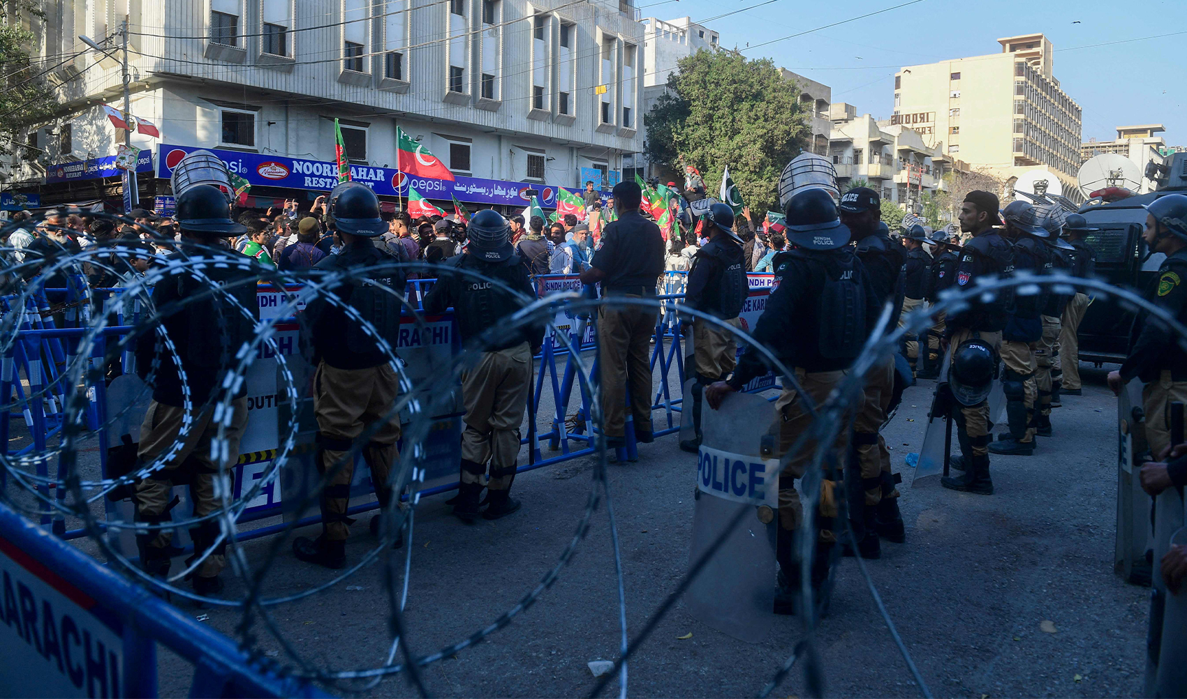 Supporters of Khan's Pakistan Tehreek-e-Insaf (PTI) party protest against the alleged skewing in Pakistan's national election results, in Karachi on February 11, 2024. (AFP)