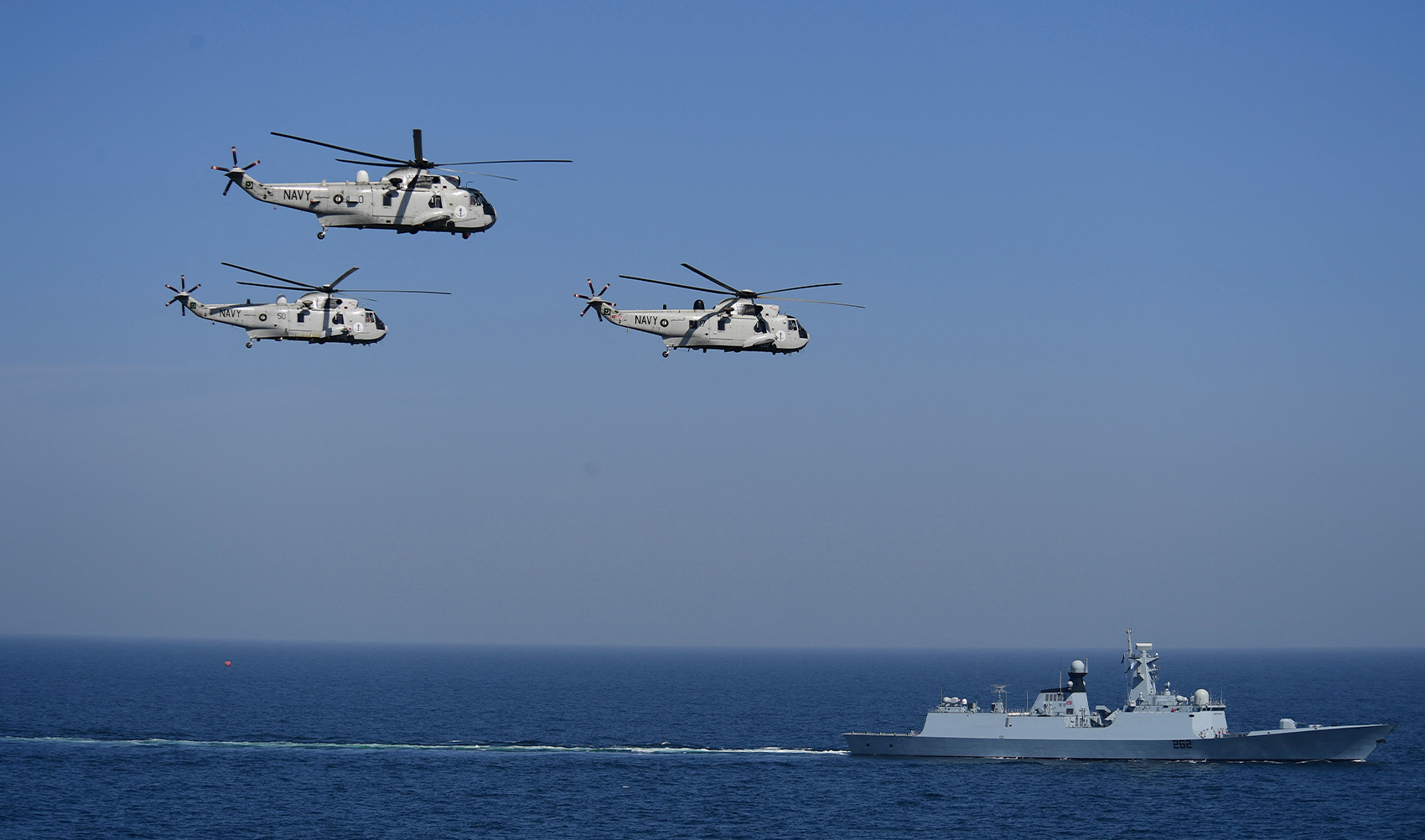 In this picture taken on February 13, 2023, Pakistan's Naval Ship Taimur and Sea King helicopters take part in the multinational naval exercise 'AMAN-23' in the Arabian Sea near Pakistan's port city of Karachi. (AFP/File)