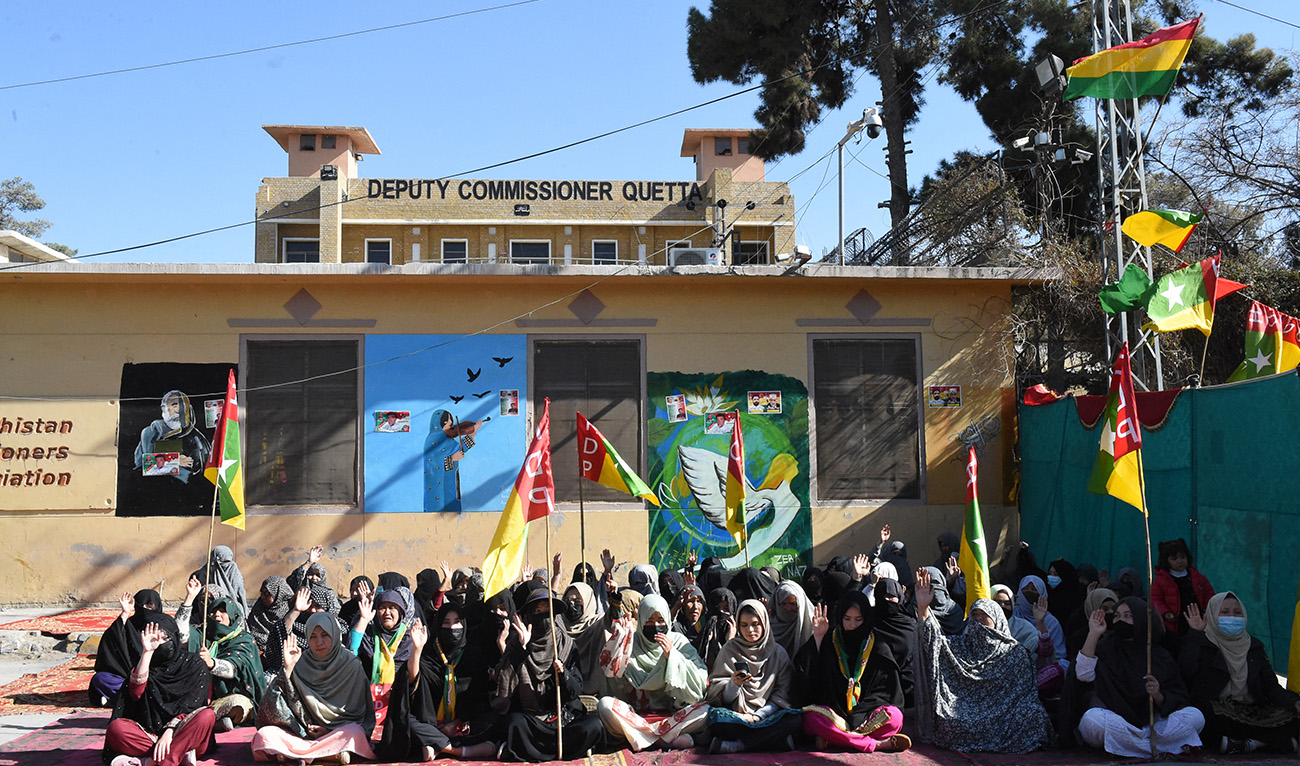 Hazara Democratic Party (HDP) activists take part in a sit-in protest outside the Deputy Comissoner Office in Quetta on February 13, 2024, amid claims of vote-rigging in Pakistan's national elections. (AFP/File)