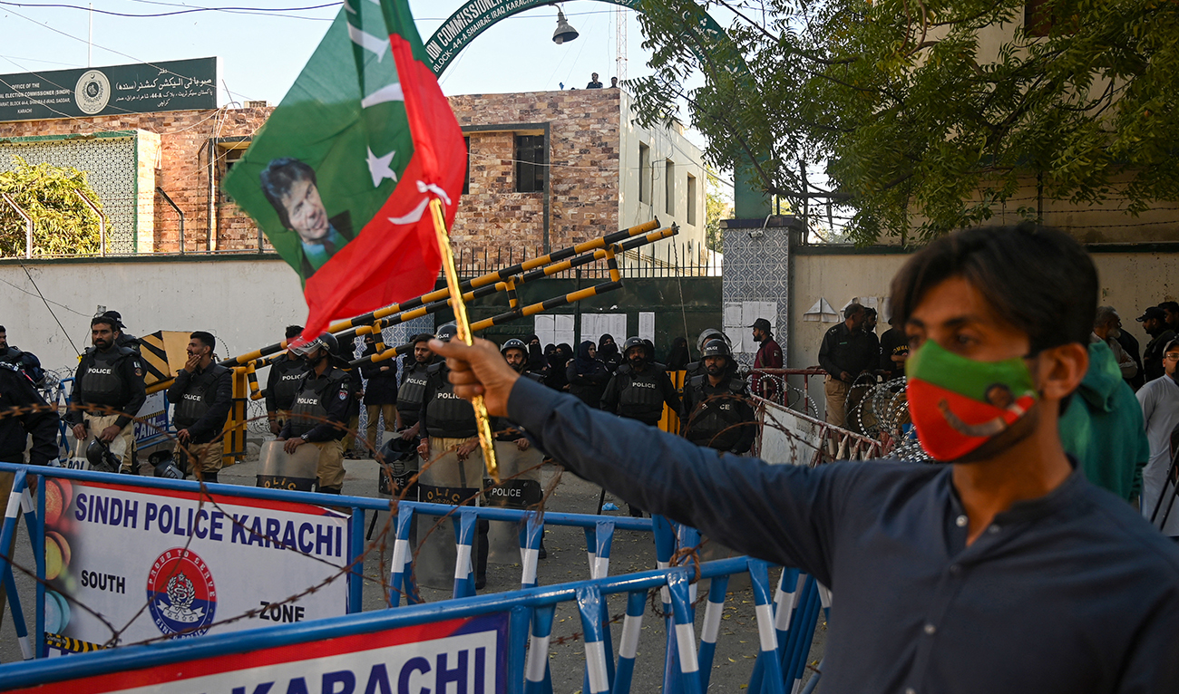 A supporter of former prime minister Imran Khan's Pakistan Tehreek-e-Insaf (PTI) party protests against the alleged skewing in Pakistan's national election results, in Karachi on February 17, 2024. (AFP)