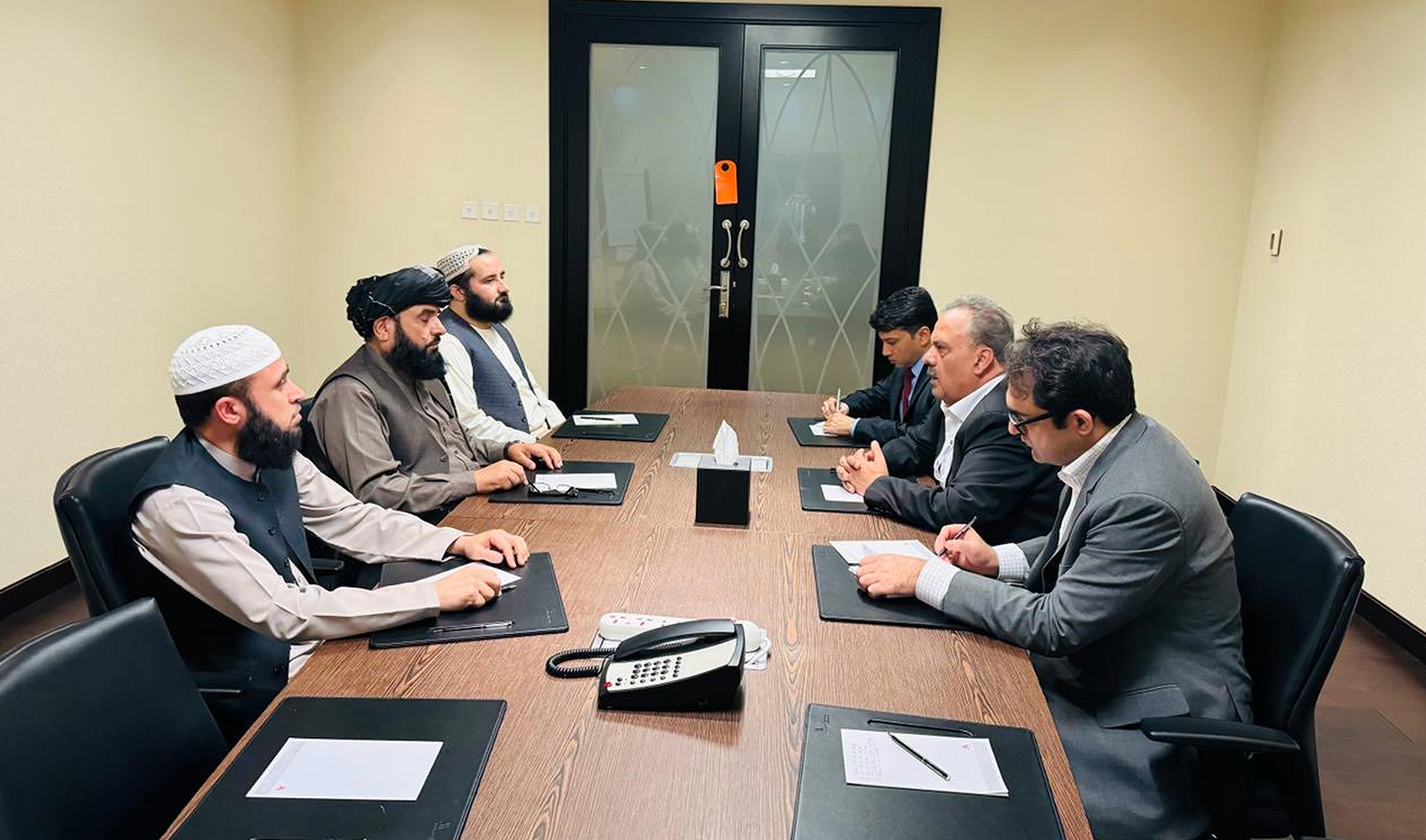 Pakistan’s special representative on Afghanistan, Asif Durrani (second from right), meets the head of the Afghan government’s political department in Doha, Suhail Shaheen (center from right) in Doha, Qatar, on February 18, 2024. (Asif Durrani/X)