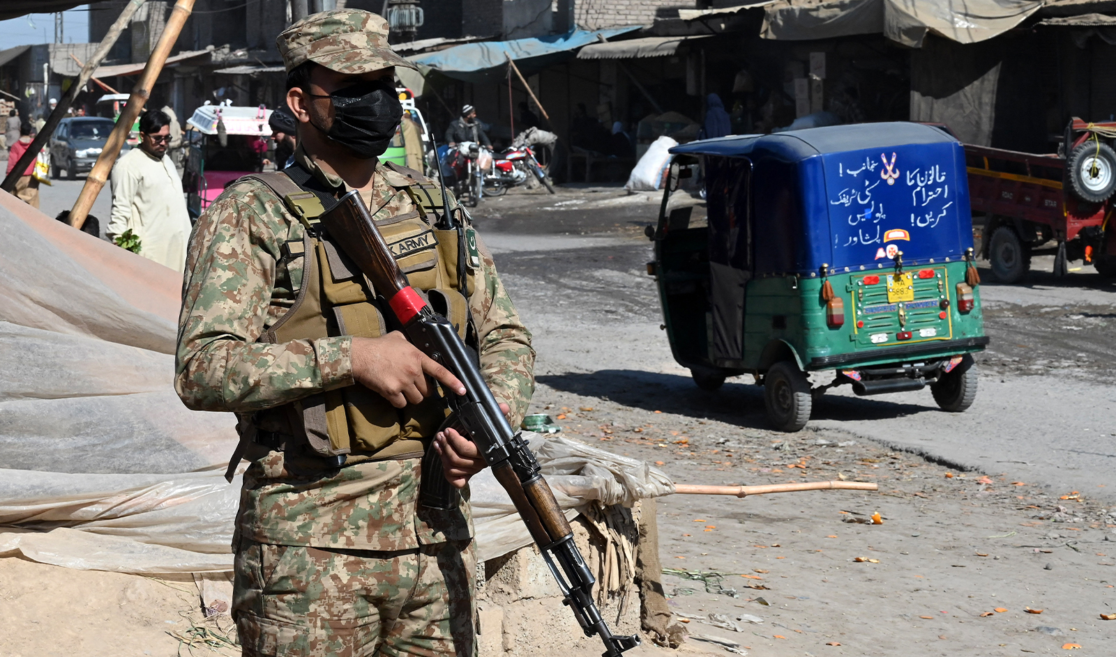 A Pakistani army personnel stands guard outside in Peshawar, Pakistan, on February 8, 2024. (AFP/File)