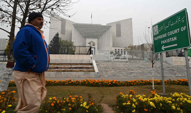 A man walks past the Pakistan's Supreme Court building in Islamabad, Pakistan, on January 12, 2024. (AFP/File)