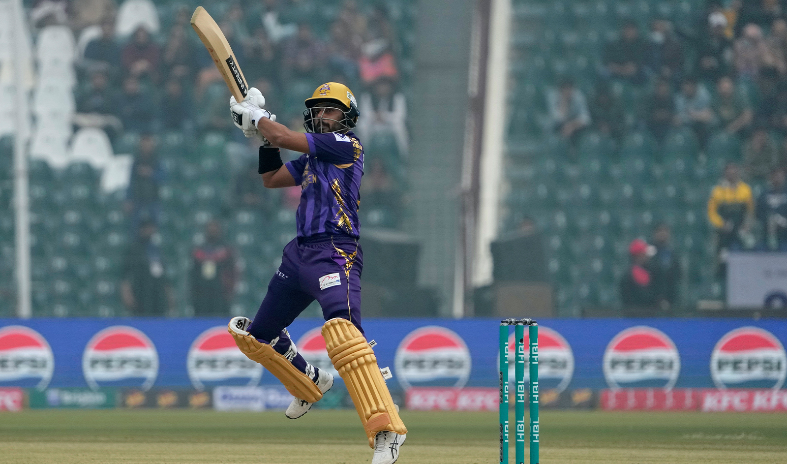 Quetta Gladiators' Saud Shakeel plays a shot during the Pakistan Super League T20 cricket match between Quetta Gladiators and Peshawar Zalmi, in Lahore, Pakistan, on February 18, 2024. (AP)