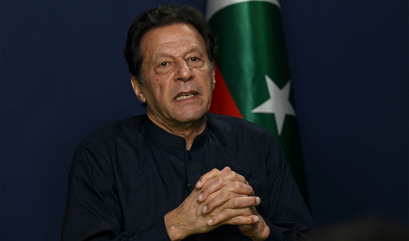 Former Pakistan's Prime Minister Imran Khan speaks during an interview with AFP at his residence in Lahore on May 18, 2023. (AFP/File)