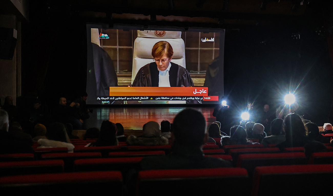 Palestinians attend a live projection of the International Court of Justice (ICJ) hearing of the case brought by South Africa against Israel, attended by the South African Ambassador to Palestine (not pictured) at the Ramallah municipality in the occupied West Bank on January 26, 2024. (AFP/File)