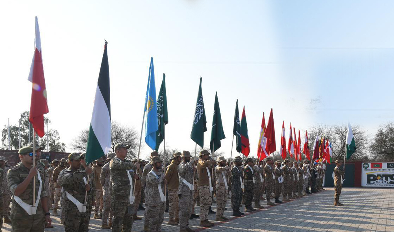In this handout photo, taken and released by Pakistan’s Inter-Service Public Relations (ISPR), Troops from several Pakistan’s friendly countries take part in the opening ceremony of the 7th International Pakistan Army Team Spirit (PATS) Exercise-2024 at the National Counter Terrorism Center in Pabbi, Nowshera District on February 25, 2024. (Photo courtesy: ISPR)