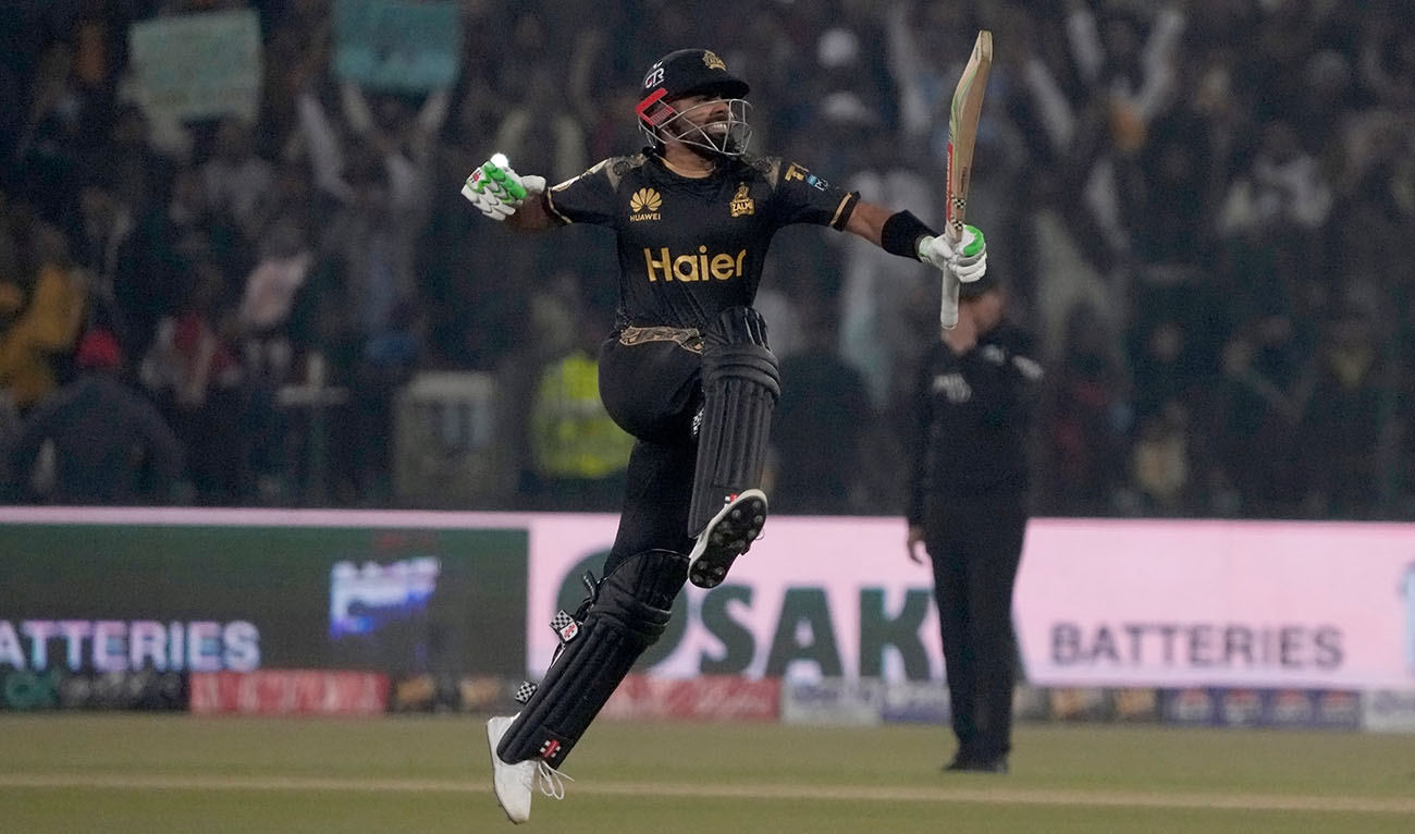 Peshawar Zalmi' Babar Azam celebrates after scoring century during the Pakistan Super League T20 cricket match between Peshawar Zalmi and Islamabad United, in Lahore, Pakistan, Monday, Feb. 26, 2024. (AP)