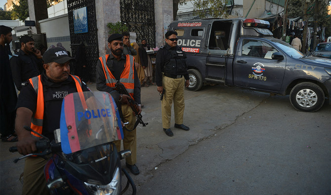 Policemen stand guard outside a mosque in Karachi, Pakistan on January 31, 2023. (AFP/File)