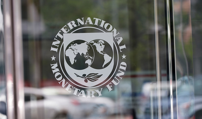 The seal of the International Monetary Fund is seen at the headquarters building in Washington, DC on July 5, 2015. (AFP/File)