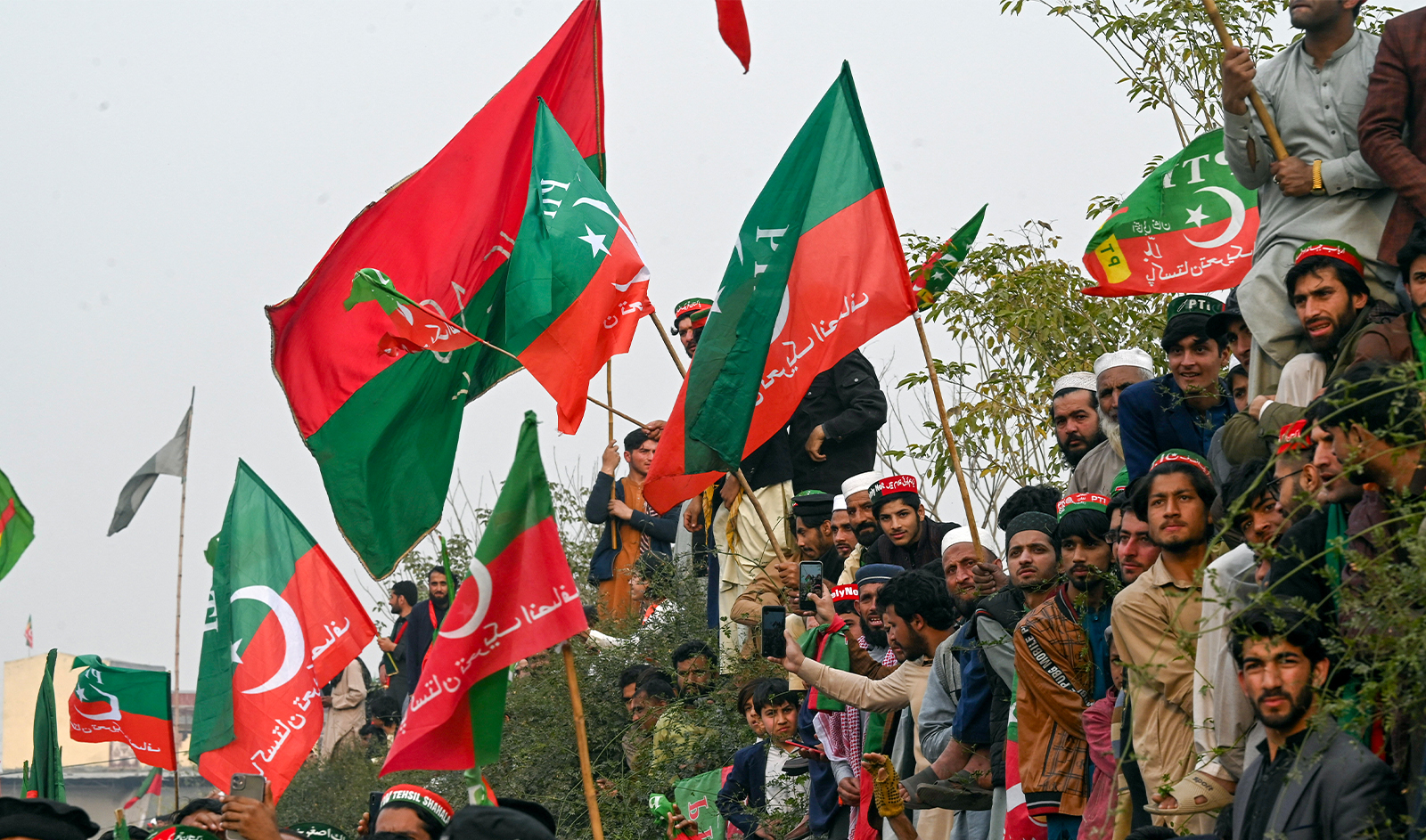 Supporters of former prime minister Imran Khan's Pakistan Tehreek-e-Insaf (PTI) party protest against the alleged skewing in Pakistan's national election results, in Peshawar on February 17, 2024. (AFP/File)
