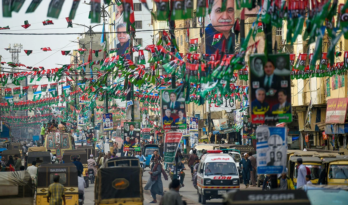 Pakistan Peoples Party (PPP) flags are hung across a street in Karachi on February 2, 2024, ahead of the general elections. (AFP)