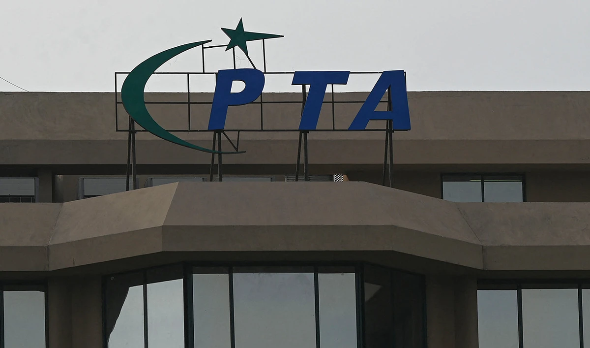 The logo of the Pakistan Telecommunication Authority is pictured on the building facade at its headquarters in Islamabad on June 24, 2023. (AFP)