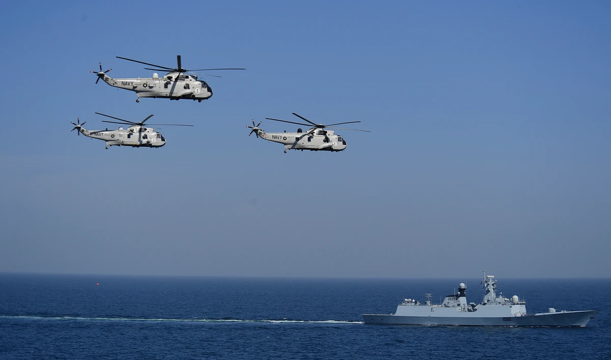 In this picture taken on February 13, 2023, Pakistan's Naval Ship Taimur and Sea King helicopters take part in the multinational naval exercise 'AMAN-23' in the Arabian Sea near Pakistan's port city of Karachi. (AFP/File)