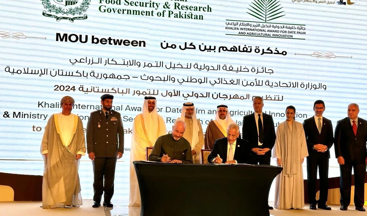 Pakistani ambassador Faisal Niaz Tirmizi (left) and Dr. Abdelouahhab Zaid, (right) General Secretary of the Khalifa International Award for Date Palm and Agricultural Innovation, sign MOU for promotion of Date Palm cultivation in Abu Dhabi, UAE on February 26, 2024. (Photo courtesy: Pakistan mission, UAE)