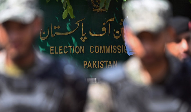 Paramilitary soldiers stand guard outside the Pakistan’s election commission building in Islamabad on August 2, 2022. (AFP/File)