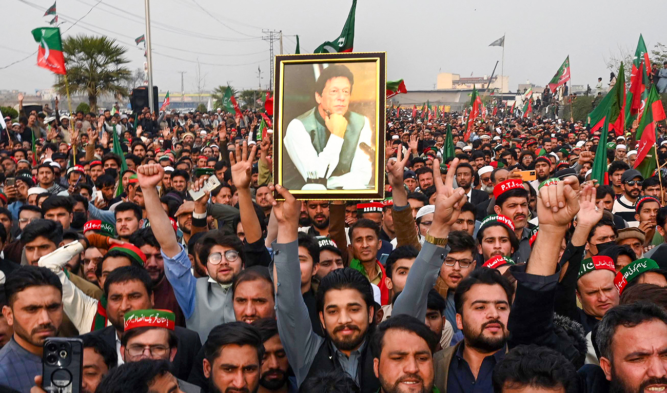 Supporters of former prime minister Imran Khan's Pakistan Tehreek-e-Insaf (PTI) party protest against the alleged skewing in Pakistan's national election results, in Peshawar on February 17, 2024. (AFP/File)