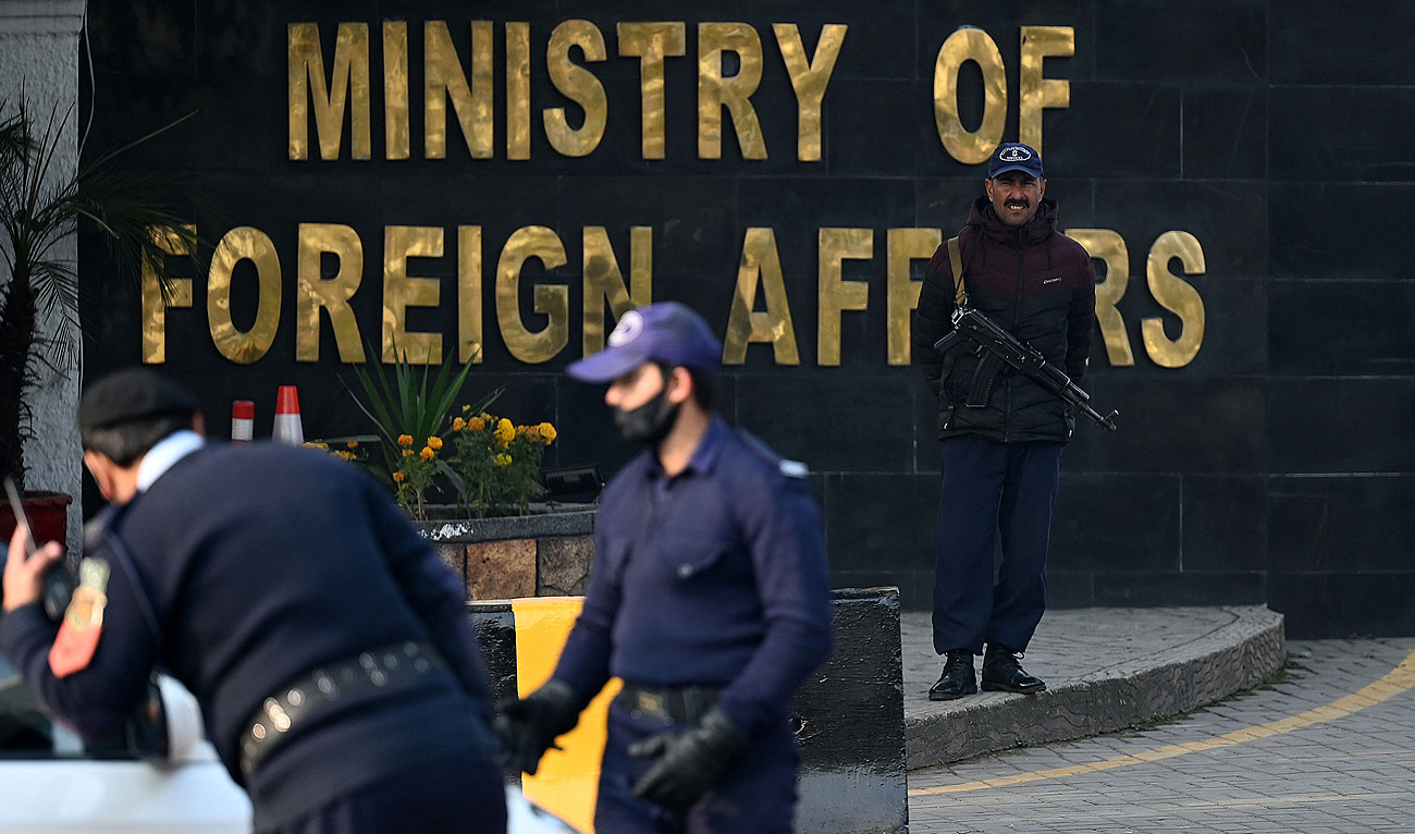 Police officers stand guard at the main entry gate of Pakistan's Ministry of Foreign Affairs, in Islamabad on January 18, 2024. (AP)