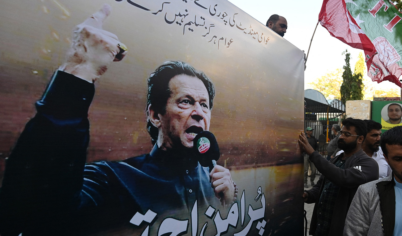Supporters of Pakistan Tehreek-e-Insaaf (PTI) party shout slogans during a protest against the alleged skewing in Pakistan's national election results, in Karachi on March 2, 2024. (AFP/File)