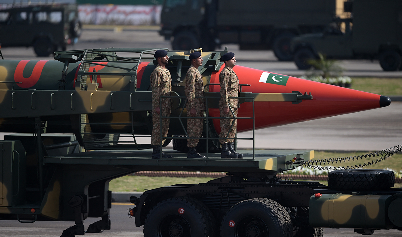 Pakistani military personnel stand beside a Ghauri nuclear-capable missile during a Pakistan Day military parade in Islamabad on March 23, 2017. (AFP/File)
