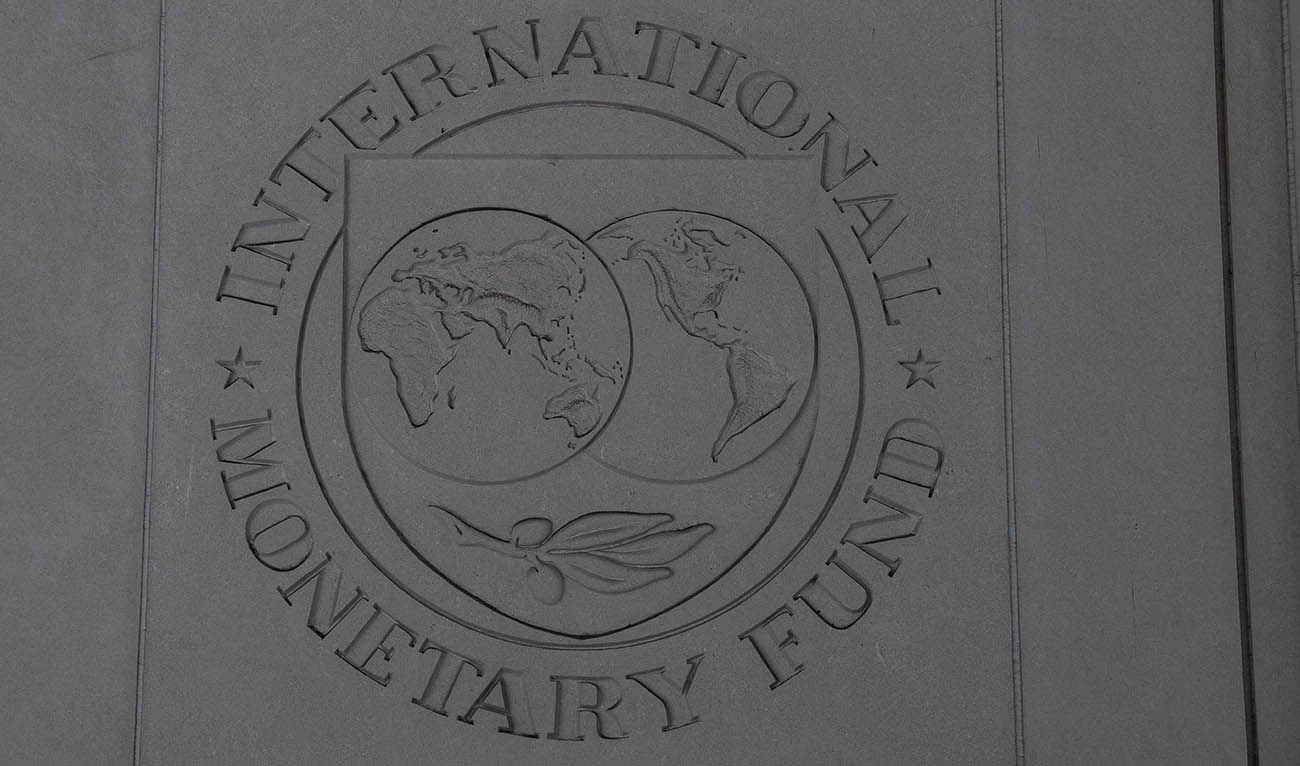 The logo of the International Monetary Fund (IMF) is seen on a wall of its headquarters in Washington, DC, on April 14, 2020. (AFP/File)