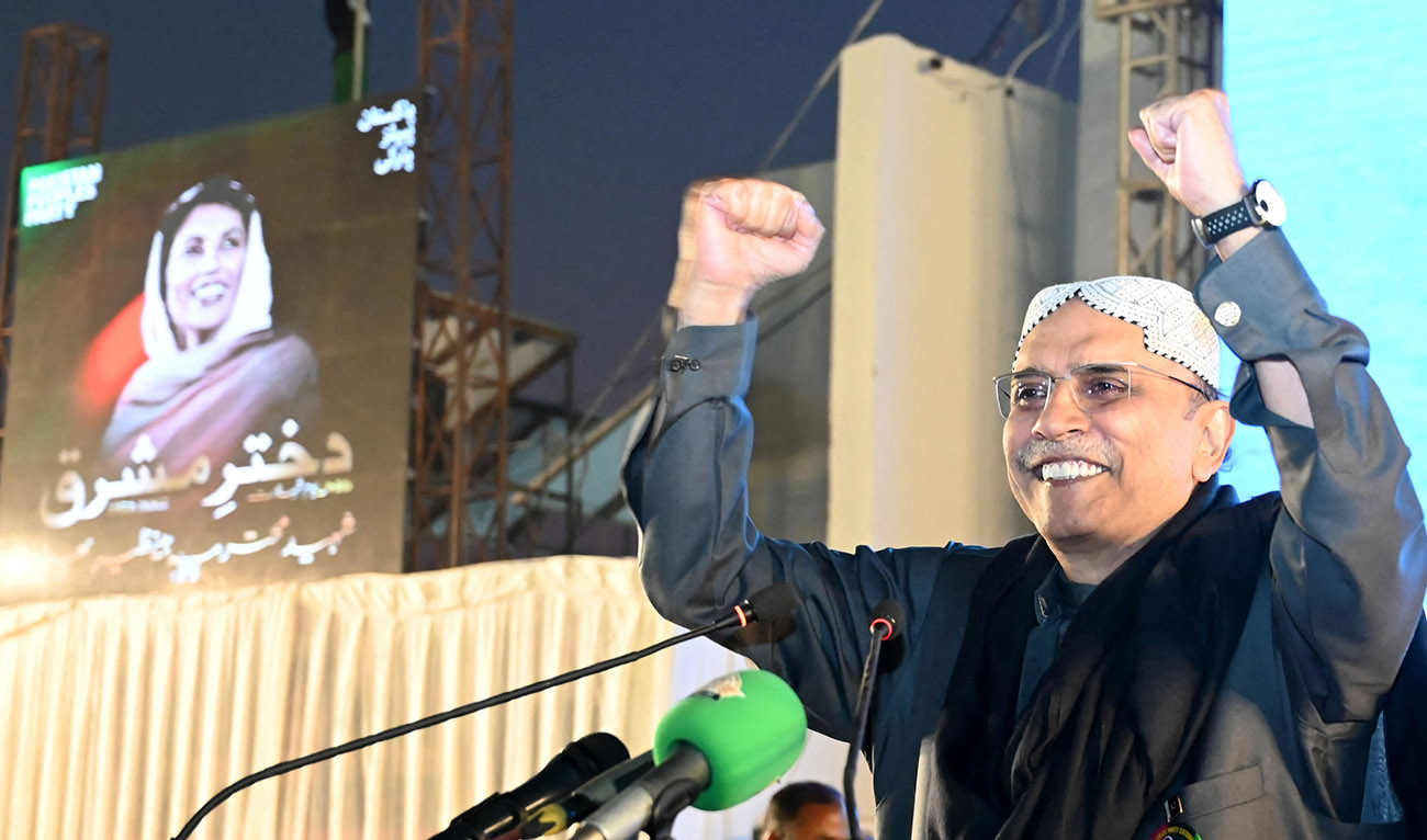 Former President of Pakistan and President of Pakistan Peoples' Party (PPP), Asif Ali Zardari gestures towards supporters during a campaign rally for the 2024 general elections in Garhi Khuda Bakhsh village, Larkana, Pakistan on December 27, 2023.