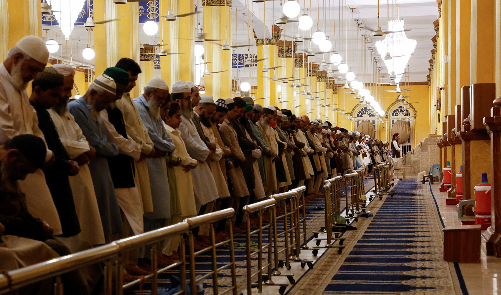 Muslims attend an evening mass prayer session called 'Tarawih' to mark the holy fasting month of Ramadan, in Karachi, Pakistan, on March 11, 2024. (REUTERS)