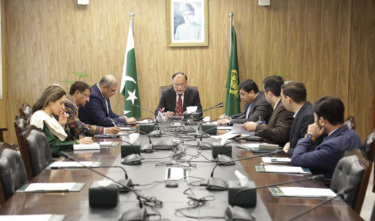 In this handout photo, taken and released by Pakistan’s Ministry of Planning, Development and Special Initiatives, Planning Minister Ahsan Iqbal chairs a meeting in Islamabad on December 13, 2024. (Facebook/@ PlanComPakistan)