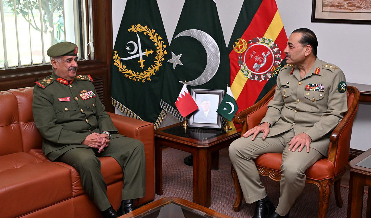 In this handout picture, taken and released by Inter Services Public Relations (ISPR) on March 15, 2024, General Shaikh Mohamed bin Isa bin Salman AI-Khalifa, Commander of the National Guard of the Kingdom of Bahrain (left) meets Pakistan Army Chief General Syed Asim Munir during his visit to the General Headquarters in Rawalpindi. (Photo courtesy: ISPR)