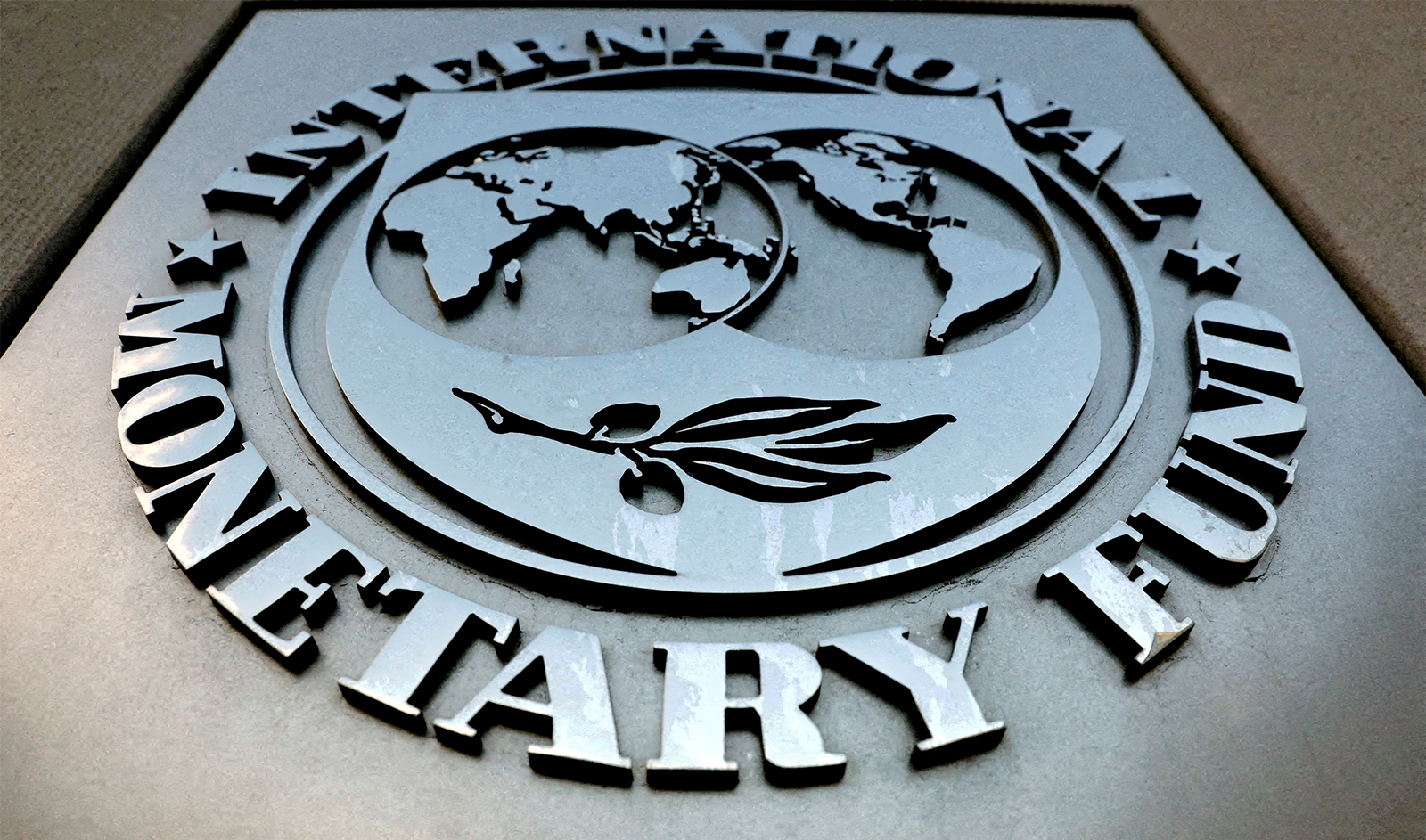 The International Monetary Fund (IMF) logo is seen outside the headquarters building in Washington, U.S., on September 4, 2018. (REUTERS/FILE)