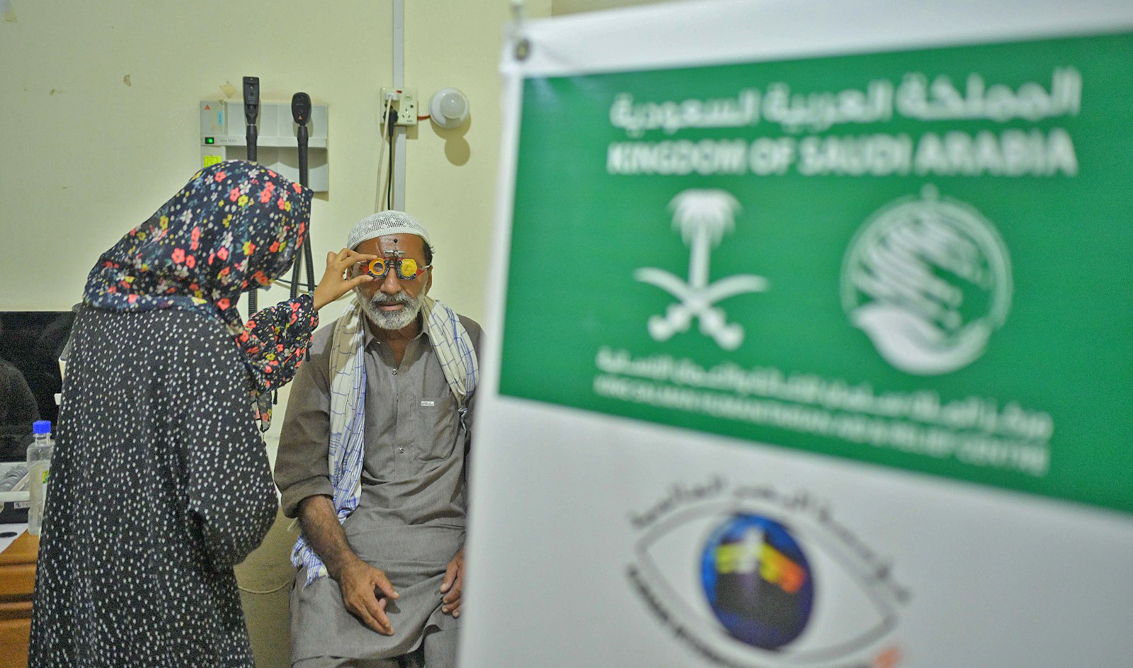 The picture shared by March 19, 2024 by King Salman Humanitarian Aid and Relief Center (KSrelief) shows a female doctor examining a patient in a medical camp sponsered by King Salman Humanitarian Aid and Relief Center (KSrelief) in Pakistan's Sindh province. (KSrelief)