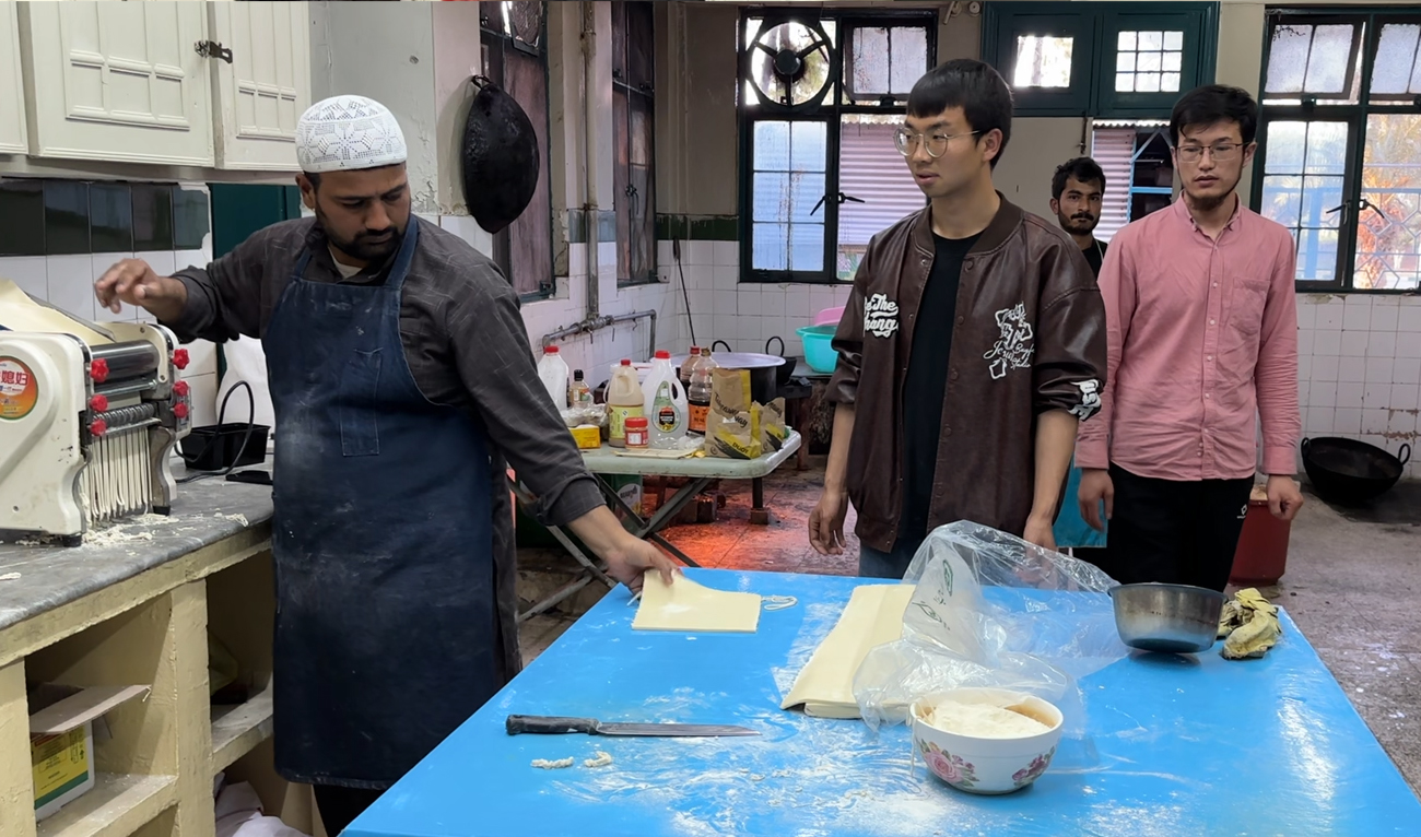 Foreign students prepare food at a private hostel in Islamabad, Pakistan on March 19, 2024. (AN Photo)