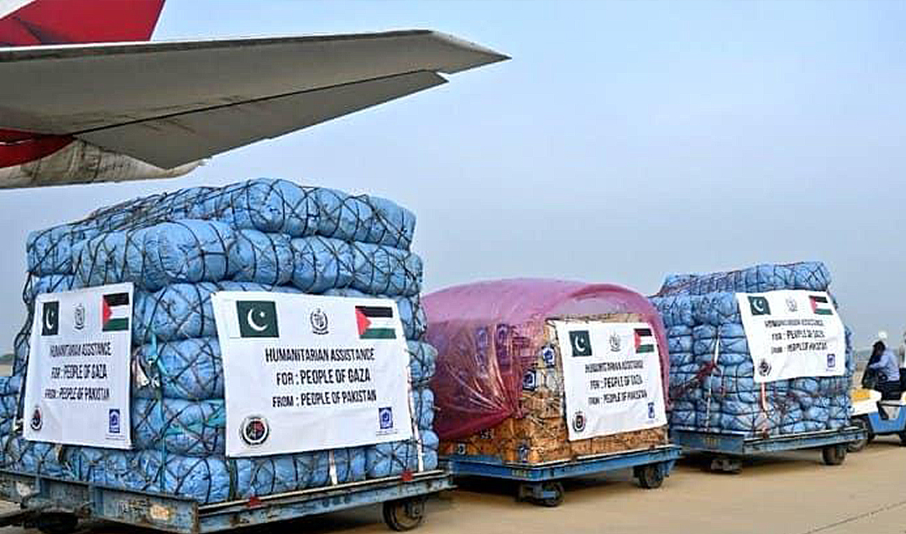 The file photo shows humanitarian aid bound for the Gaza Strip through Egypt being loaded into a military aircraft in Rawalpindi, Pakistan on February 6, 2024. (NDMA)
