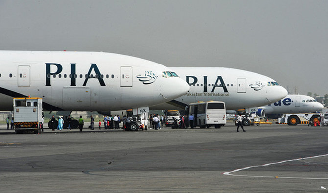 Pakistan International Airline (PIA) planes are positioned on the tarmac at the Benazir Bhutto International Airport in Islamabad on October 10, 2012. (AFP/File)