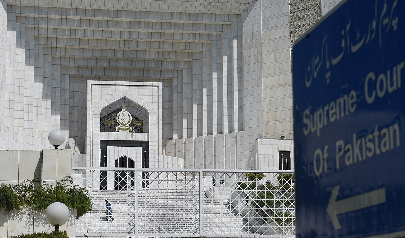 A Pakistani man walks by the Supreme Court building in Islamabad on September 15, 2017. (AFP/File)
