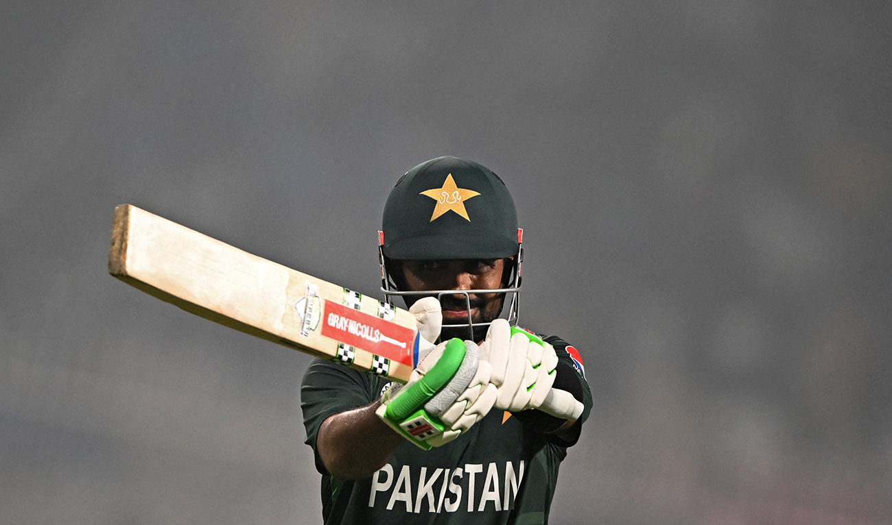 Pakistan's Babar Azam reacts as he walks back to the pavilion after his dismissal during the 2023 ICC Men's Cricket World Cup one-day international (ODI) match between England and Pakistan at the Eden Gardens in Kolkata on November 11, 2023. (AFP/File)