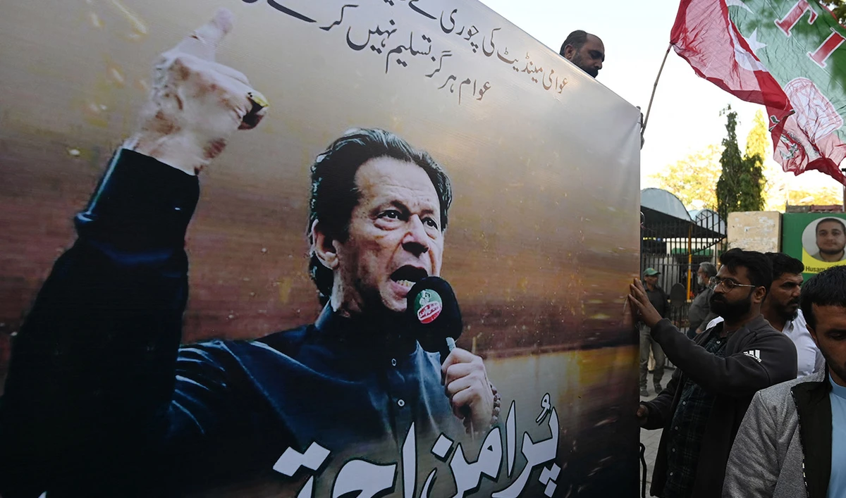 Supporters of Pakistan Tehreek-e-Insaaf (PTI) party shout slogans during a protest against the alleged skewing in Pakistan's national election results, in Karachi on March 2, 2024. (AFP/File)