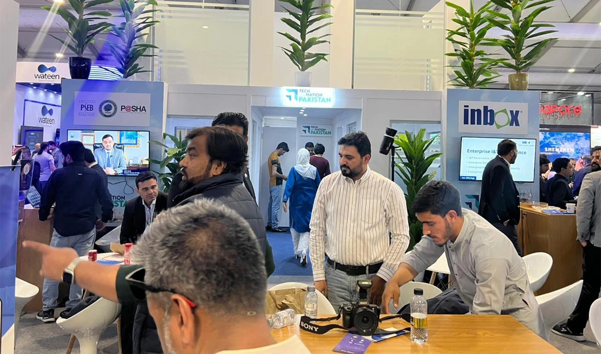 Pakistani IT company representatives brief participants about their products at LEAP24 in Riyadh, Saudi Arabia on March 4, 2024. (Hassan Khan Lodhi)