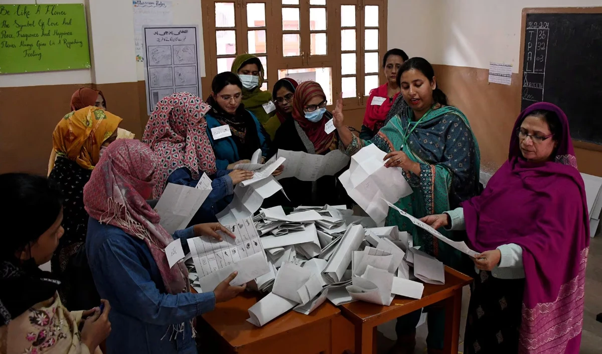 Polling staff count ballots after the end of the voting at a polling station during a general election, in Hyderabad, Pakistan, February 8. (REUTERS/File)