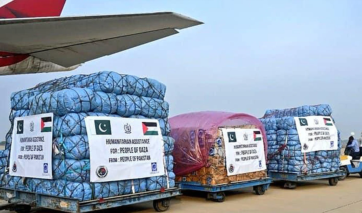 The file photo shows humanitarian aid bound for the Gaza Strip through Egypt being loaded into a military aircraft in Rawalpindi, Pakistan on February 6, 2024. (NDMA)
