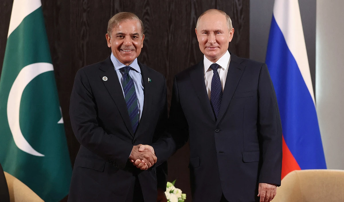 Russian President Vladimir Putin meets with Prime Minister of Pakistan Shehbaz Sharif on the sidelines of the Shanghai Cooperation Organisation (SCO) leaders' summit in Samarkand on September 15, 2022. (AFP/File)