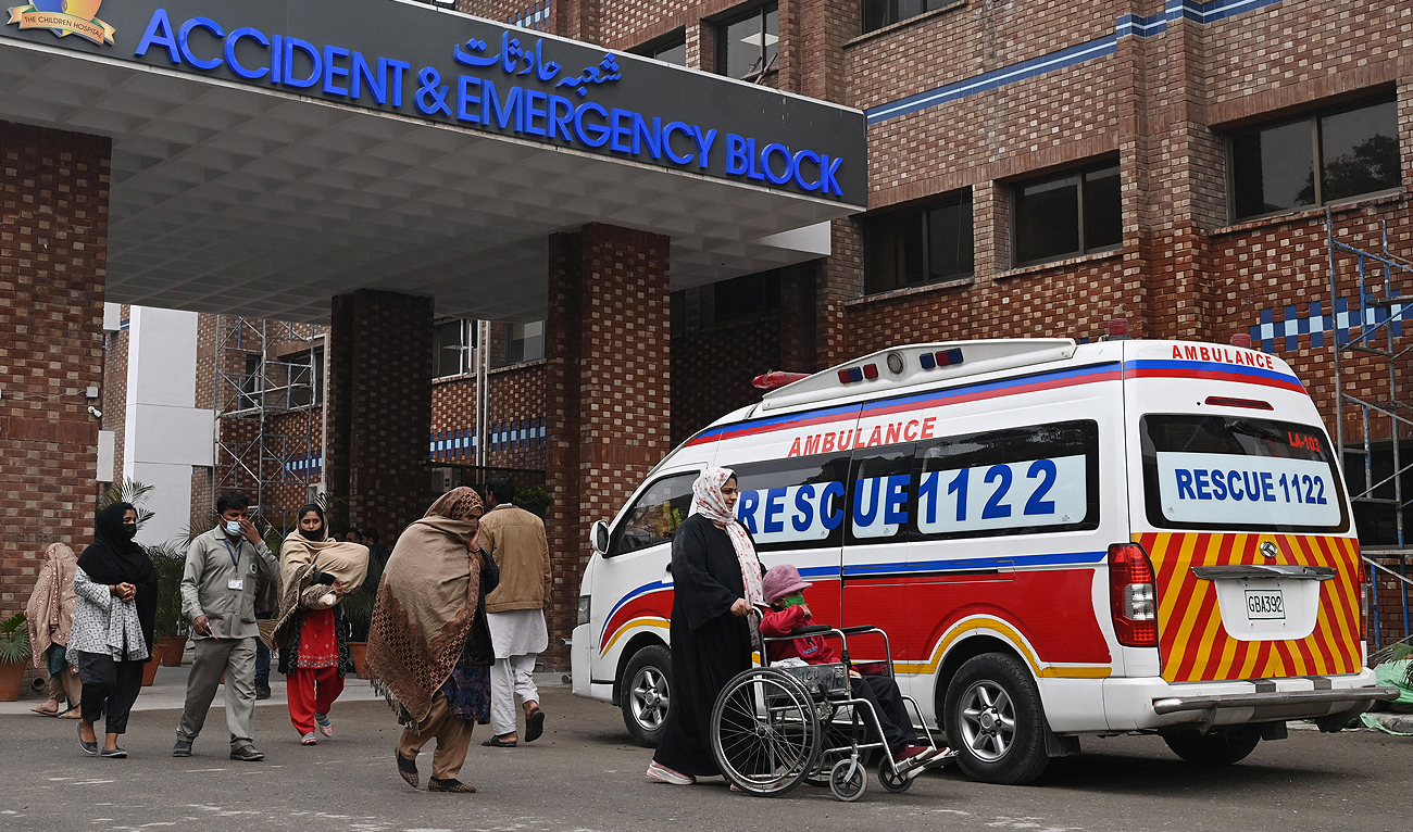 In this file photo, taken on January 31, 2024, people walk at the Children’s Hospital in Lahore. (AFP/File)
