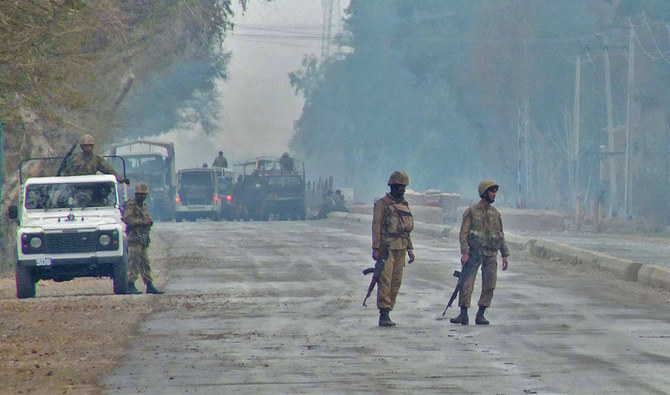 Pakistani troops patrol near the military checkpost in the Sari Norang area of Lakki Marwat district, Pakistan, on February 2, 2013. (AFP/File)