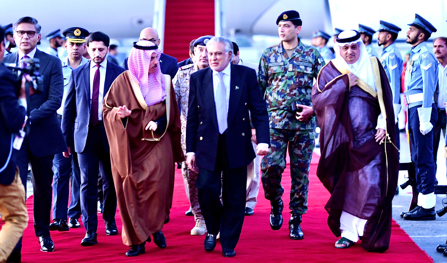 Pakistan's foreign minister Ishaq Dar (center right) receives his Saudi counterpart, Prince Faisal bin Farhan (center left), at Nur Khan air base in Rawalpindi, Pakistan on April 15, 2024. (Government of Pakistan)