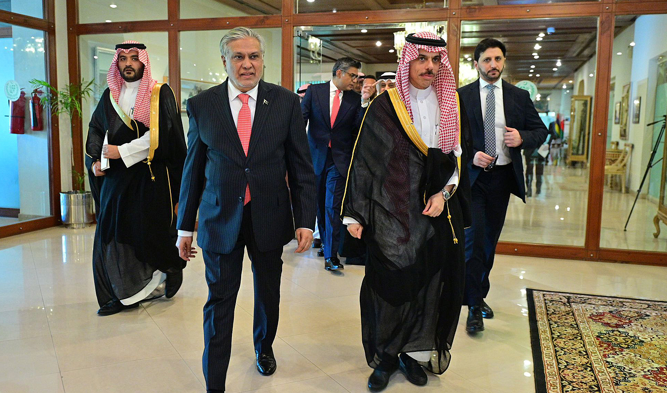 In this handout photo, taken and released by Pakistan’s Foreign Ministry, Pakistani Foreign Minister Ishaq Dar welcomes his Saudi counterpart Prince Faisal bin Farhan and his high level delegation from Saudi Arabia at the Ministry of Foreign Affairs in Islamabad on April 16, 2024. (Photo courtesy: MOFA)
