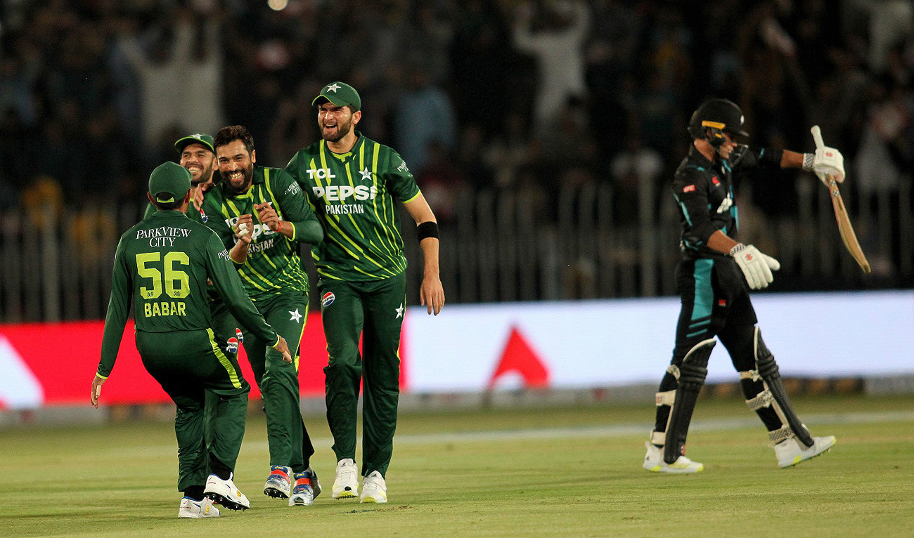 Pakistan's Mohammad Amir (3R) celebrates with teammates after taking the wicket of New Zealand's Tim Robinson (R) during the second Twenty20 international cricket match between Pakistan and New Zealand at the Rawalpindi Cricket Stadium in Rawalpindi on April 20, 2024. (Photo courtesy: PCB)
