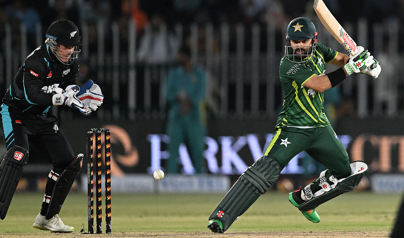 Pakistan’s Mohammad Rizwan (R) plays a shot during the second Twenty20 international cricket match between Pakistan and New Zealand at the Rawalpindi Cricket Stadium in Rawalpindi, on April 20, 2024. (AFP)