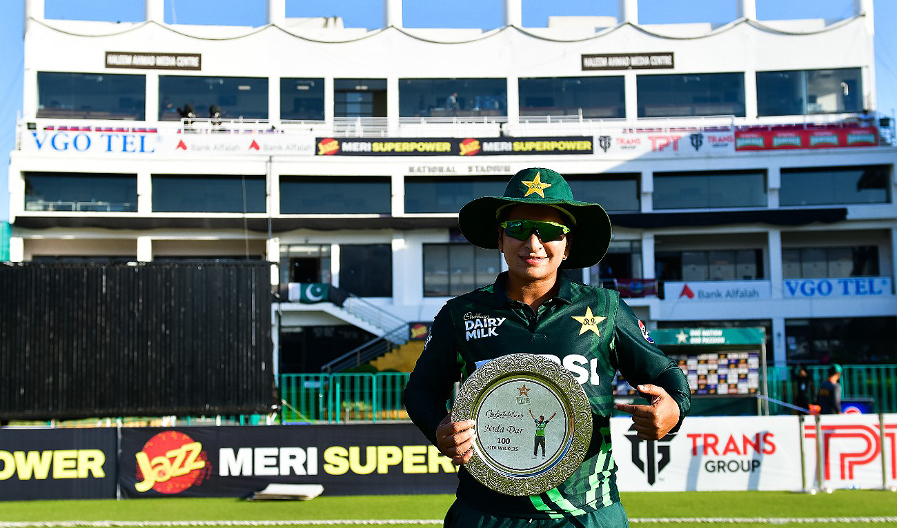 Pakistan’s Nida Dar gestures with her shield for achieving 100th One Day International wicket during the match against West Indies at the National Stadium in Karachi on April 21, 2024. (Photo courtesy: PCB)